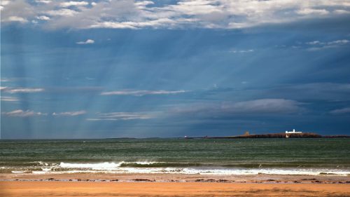 Tony Nicholls Rays over the Farne Islands
