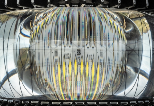 Reflection in a Lighthouse Bulb by Mike Rowlinson