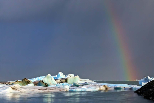 Landscape-Rainbow-Over-Jokulsarlon-Icebergs by Keith Snell